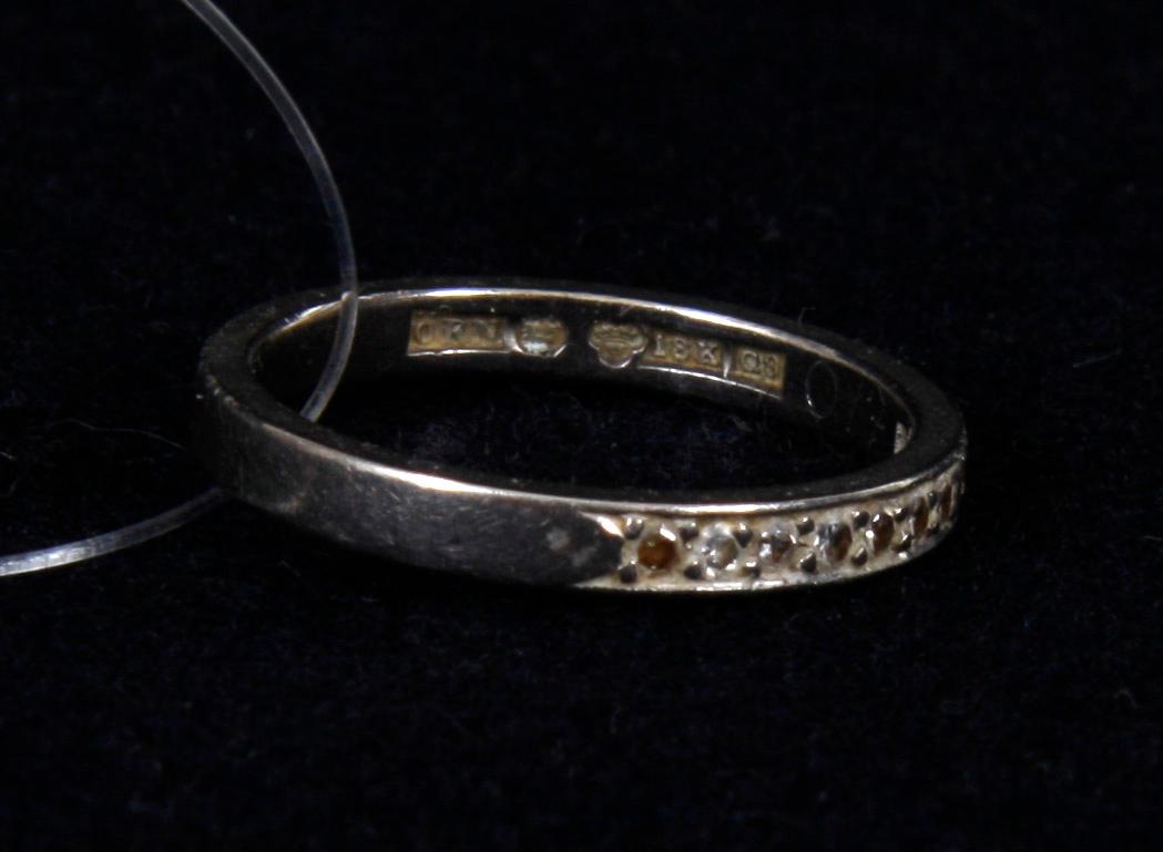 ALLIANSRING, 18K vitguld och briljanter.