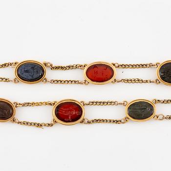 An 18K gold and hardstone intaglio necklace, 19th century.
