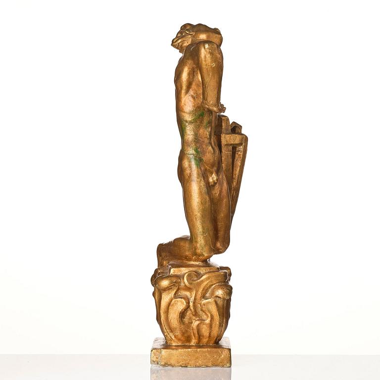 John Lundqvist, a gilded plaster sculpture of a lyre player, dated 1928.