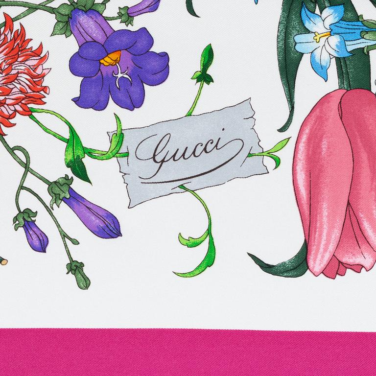 Gucci, a 'Flora' twill silk scarf.