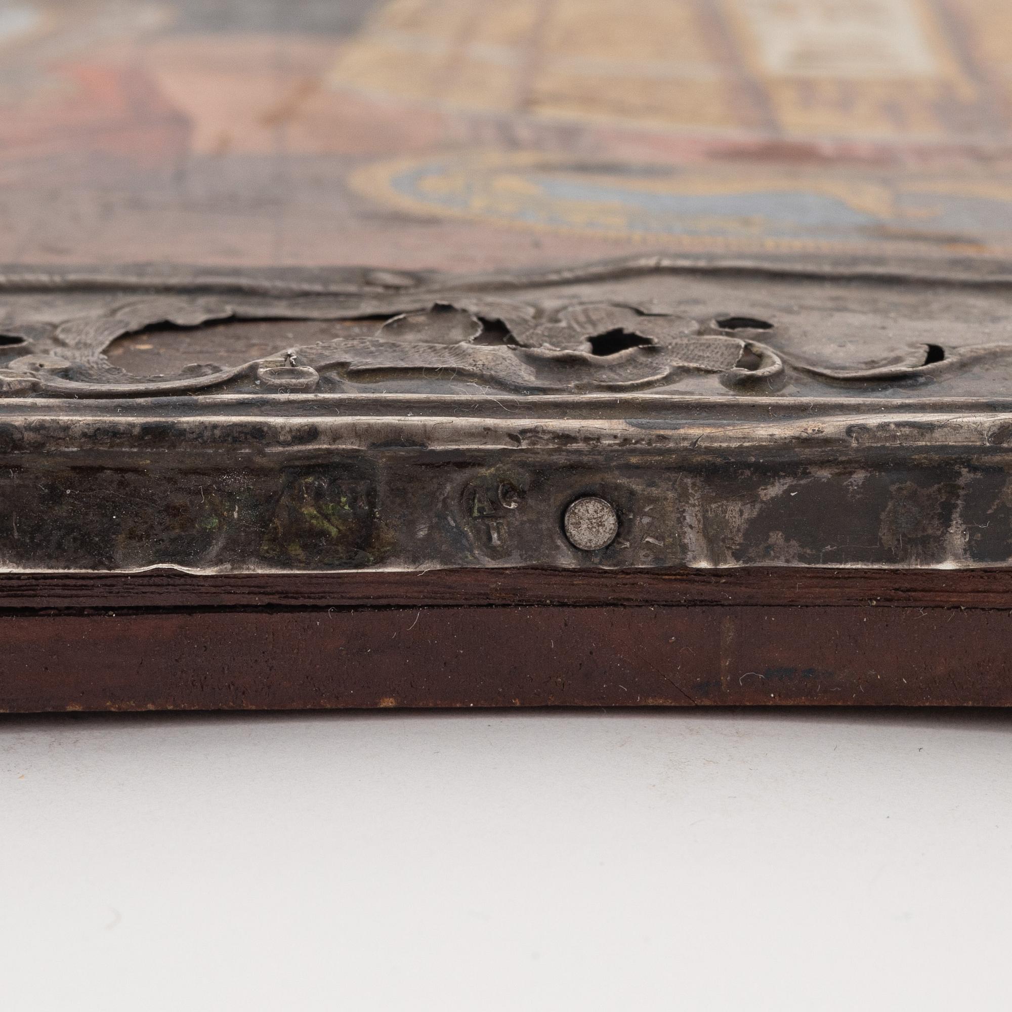 A silver and tempera on wood icon, Moscow 1776.