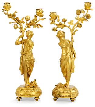 A pair of Louis XVI late 18th century two-light candelabra in  the manner of Falconet.