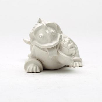 Wilhelm Kåge, a set of stoneware figures of a 'dragon puppy' and two 'dragon puppies' with candle holders, Gustavsberg, ca 1940.