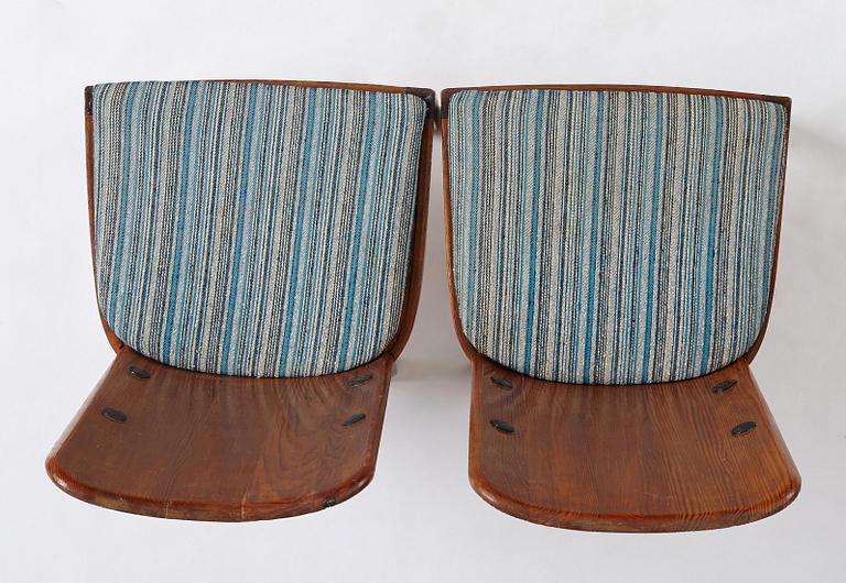 Axel Einar Hjorth, a pair of stained pine "Lovö" chairs, Nordiska Kompaniet, Sweden 1930's.