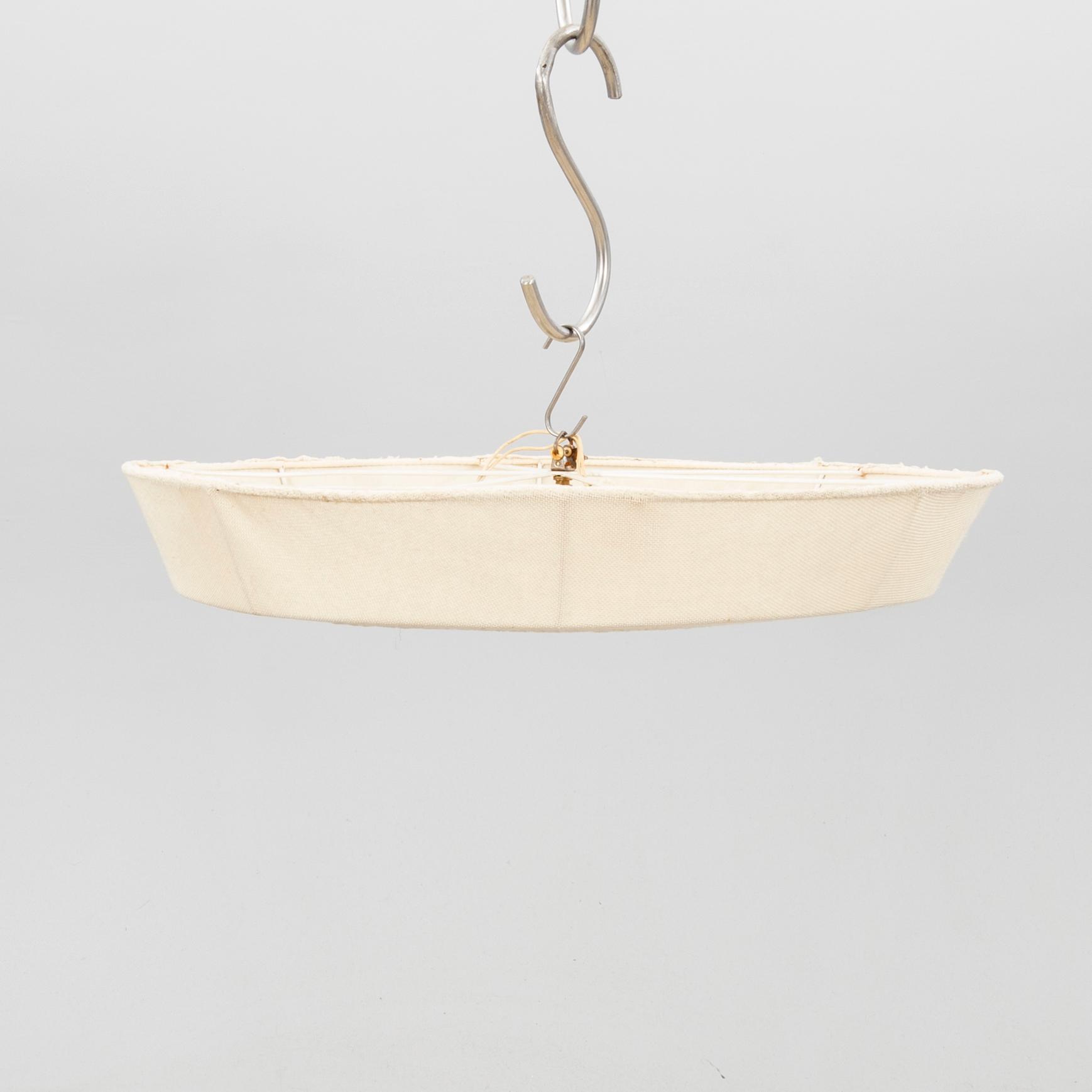 A ceiling light form the first half of the 20th century.