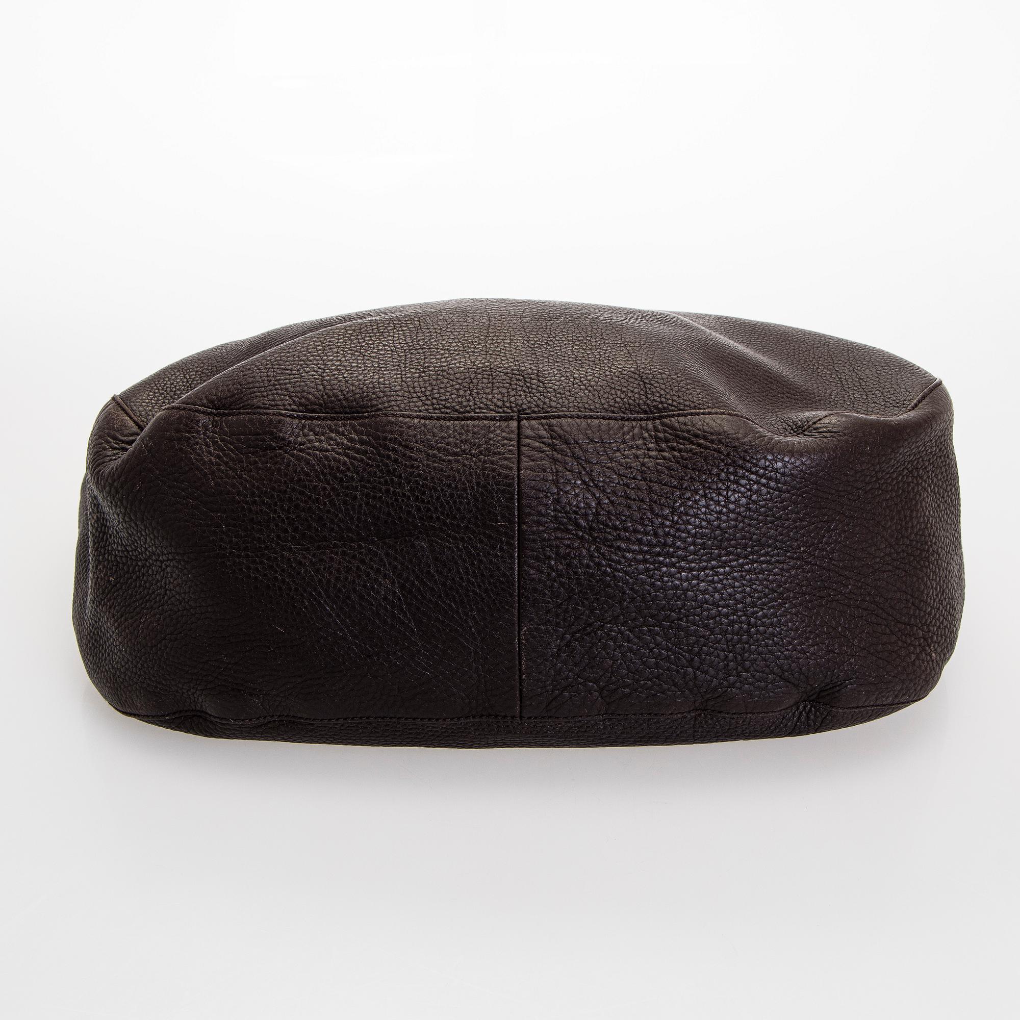 Gucci, an "Interlocking G" bag.