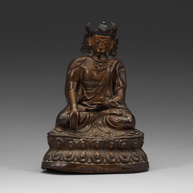 A copper alloy and gilt repoussé Bodhisattva, 17th/18th century.