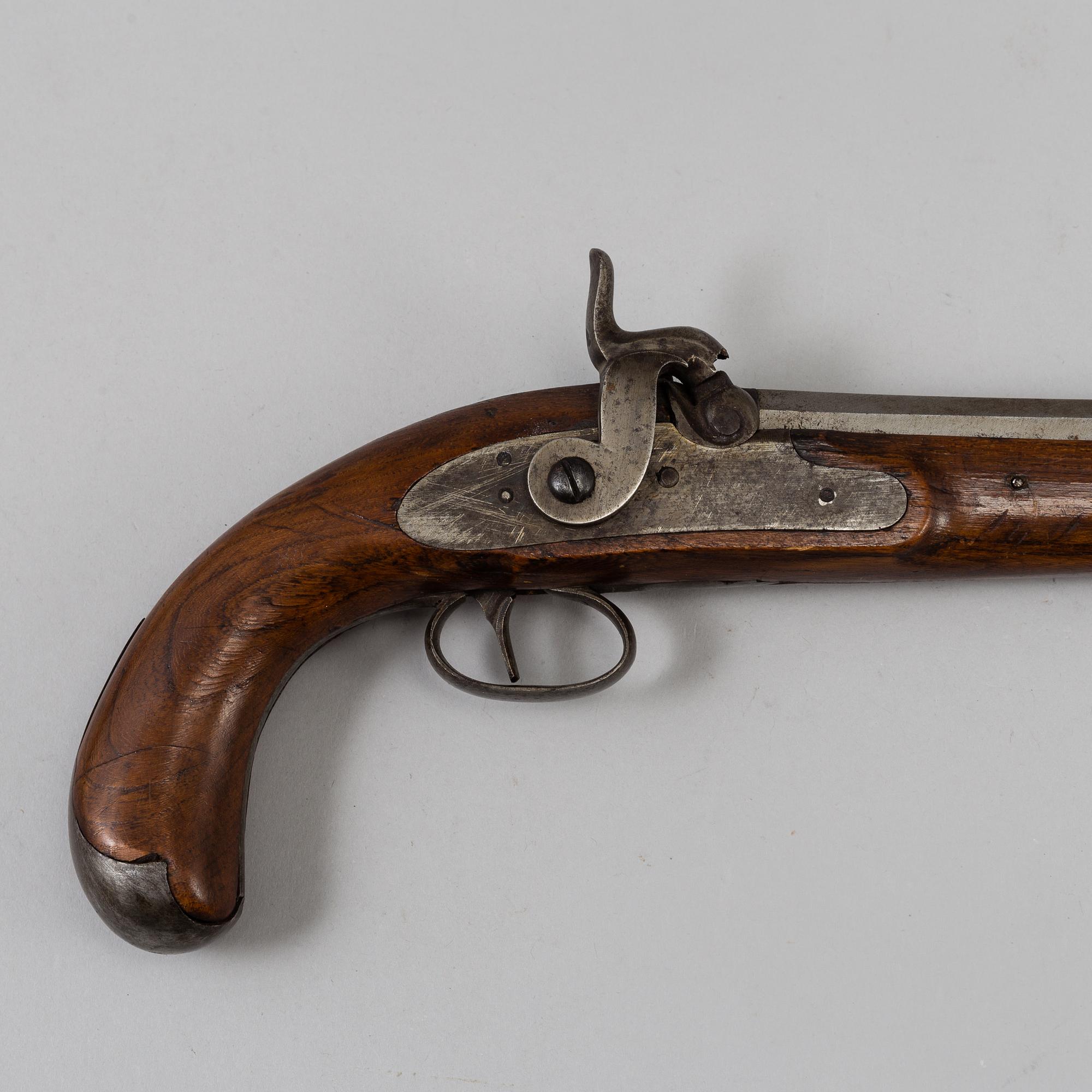 One flint lock postol, late 18th ct, and one percussion pistol, 19th ct.