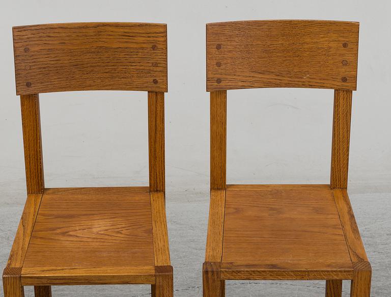 MARIO PRANDINA, an oak table and four chairs, Plinio Il Giovane, Italy.