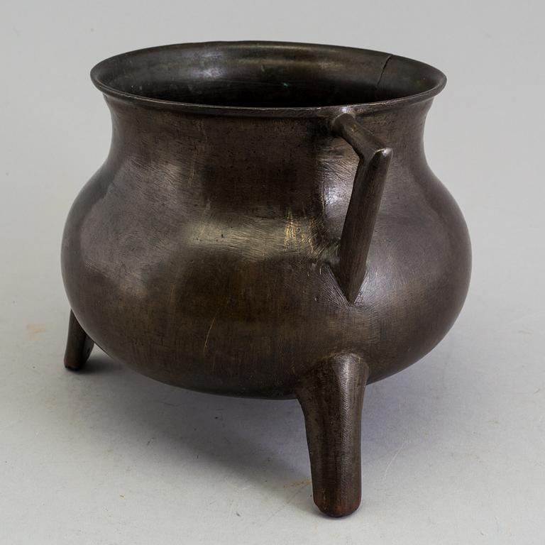 A medieval bronze pot.