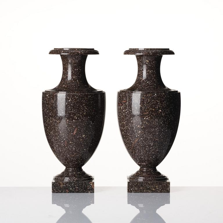 A pair of Swedish early 19th century 'Blyberg' porphyry urns.