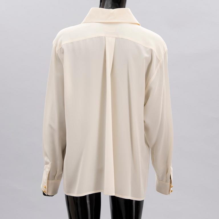 Two Chanel Crepe de Chine Cream Coloured Silk Blouses.