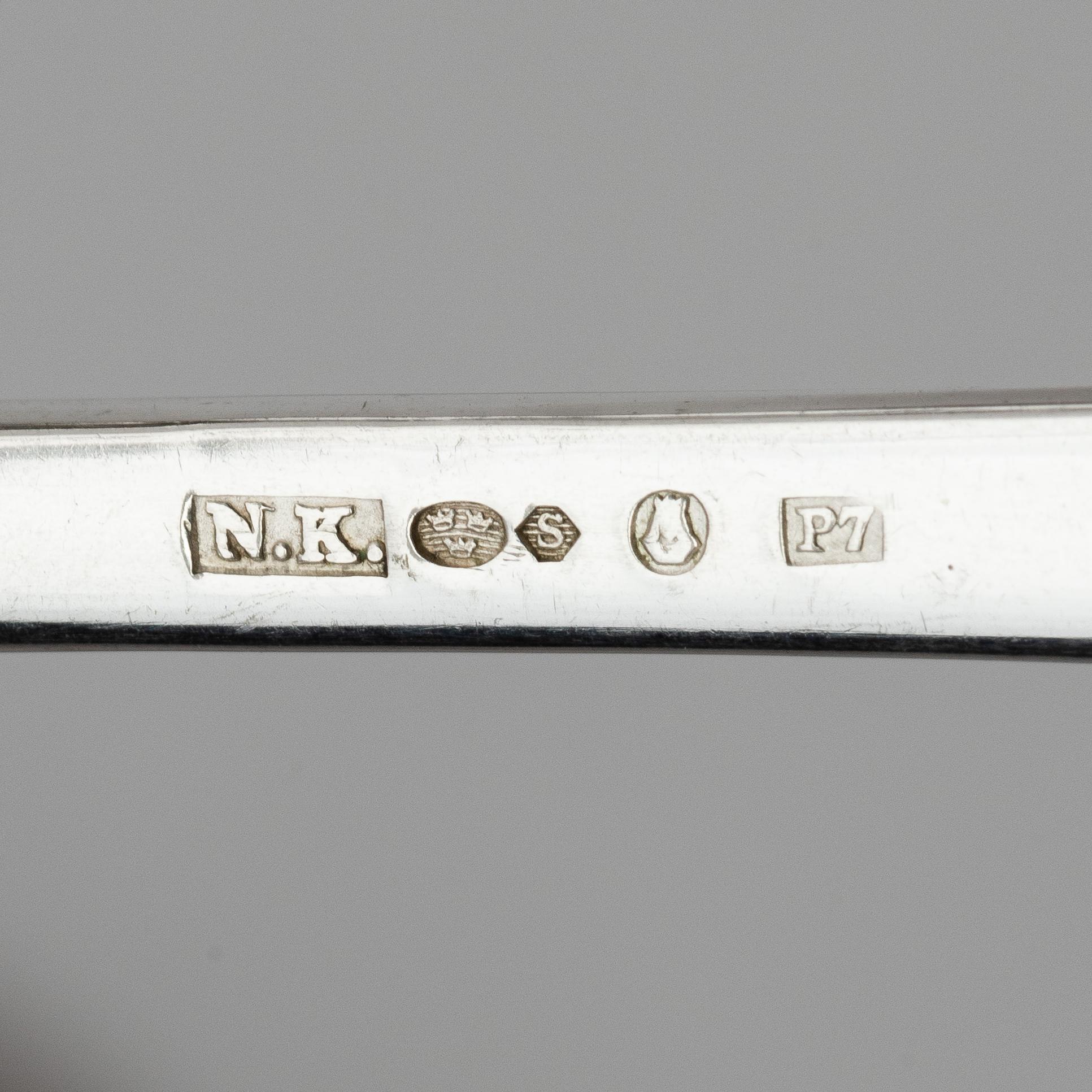 A Swedish 156 piece silver table-cutlery with wood box, mark of company Nordiska Kompaniet, Stockholm 1917.
