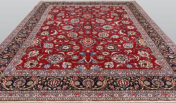 A Meshed carpet, approx. 340 x 295 cm.