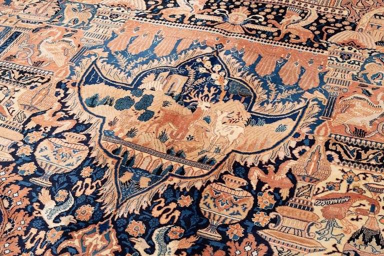 A figural Kashmar carpet, c. 375 x 295 cm.