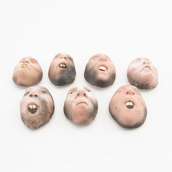 Johan Thunell a set of seven signed ceramic sculptures.