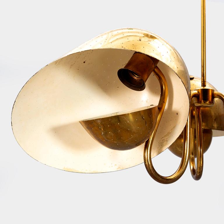 A 1940s Carl-Axel Acking brass ceiling pendant from Bröderna Malmströms.