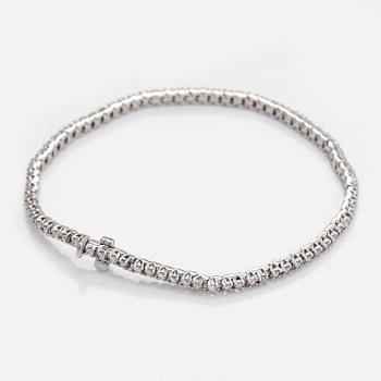 A 14K whitegold tennis bracelet, brilliant-cut diamonds totalling aprox. 1.12 ct according to engraving. Finnish marks.