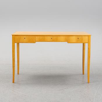 A 'Nya guldheden' desk by Carl Malmsten.