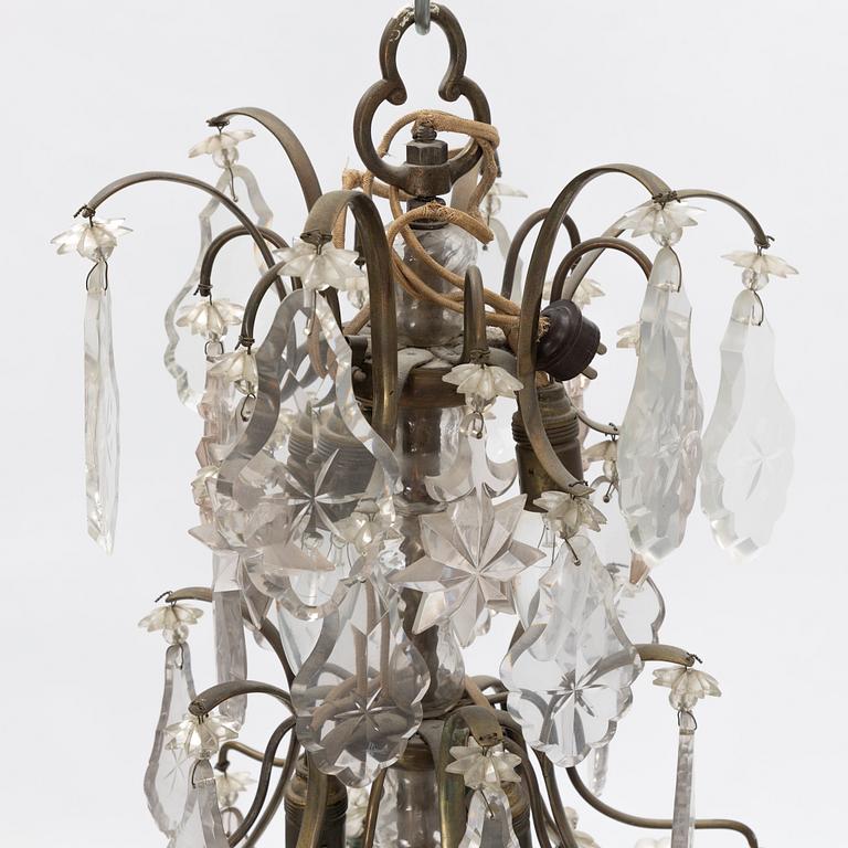 A six-light rococo-style chandelier, later part of the 20th century.