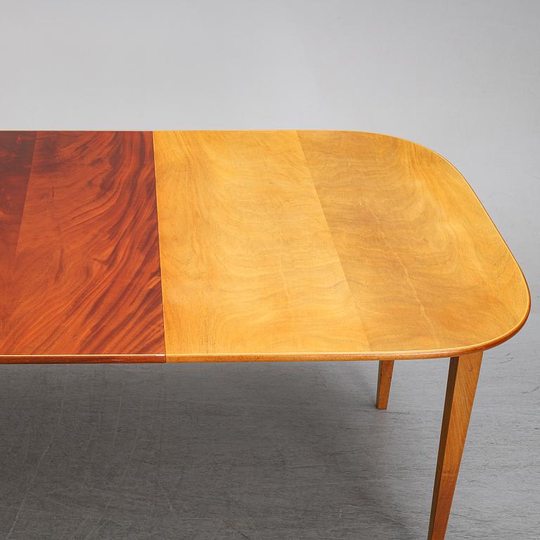 Josef Frank, a model '947' mahogany veneered dinner table for Firma Svenskt Tenn.