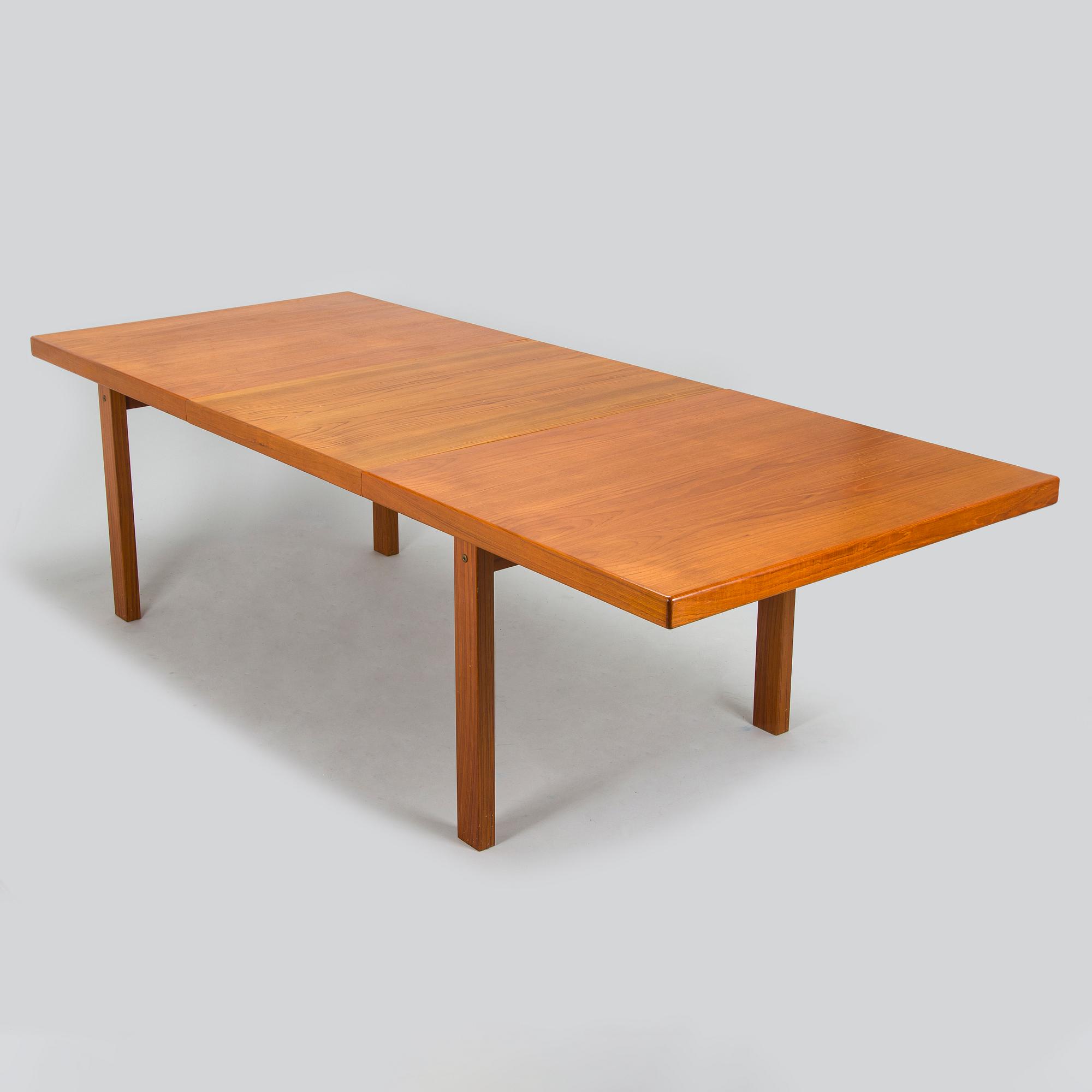 A mid-20th century dining table.