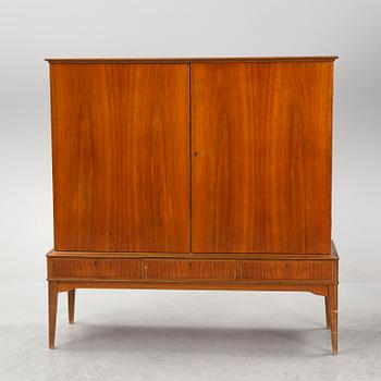 A walnut veneered cabinet, 1940's/50's.