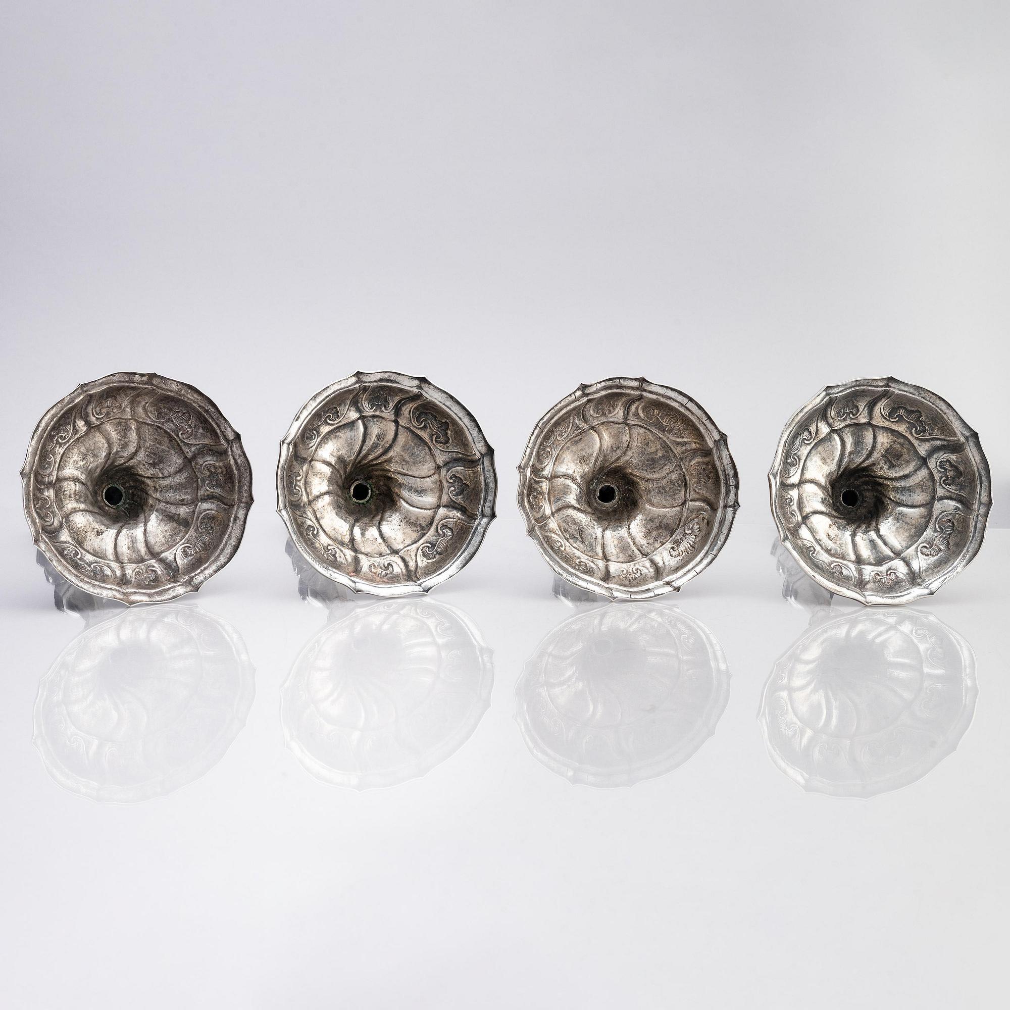 Four silver candlesticks, marks of Christian Drentwett II, Augsburg (1765-1767), two (1781-1783) and possibly (1743-45).