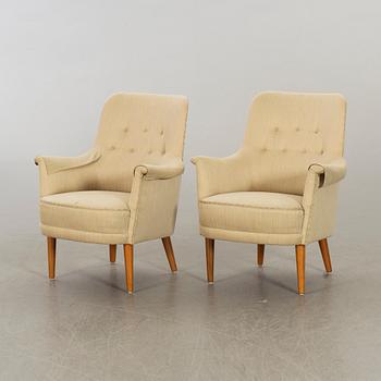 CARL MALMSTEN, a pair of easy chairs.