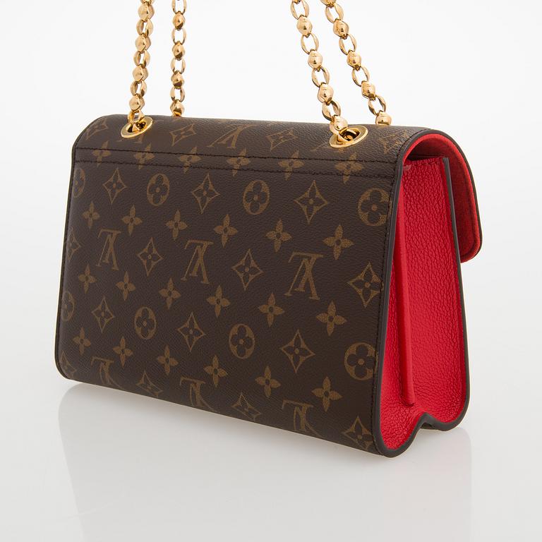 LOUIS VUITTON, A Monogram 'Victoire' Bag.