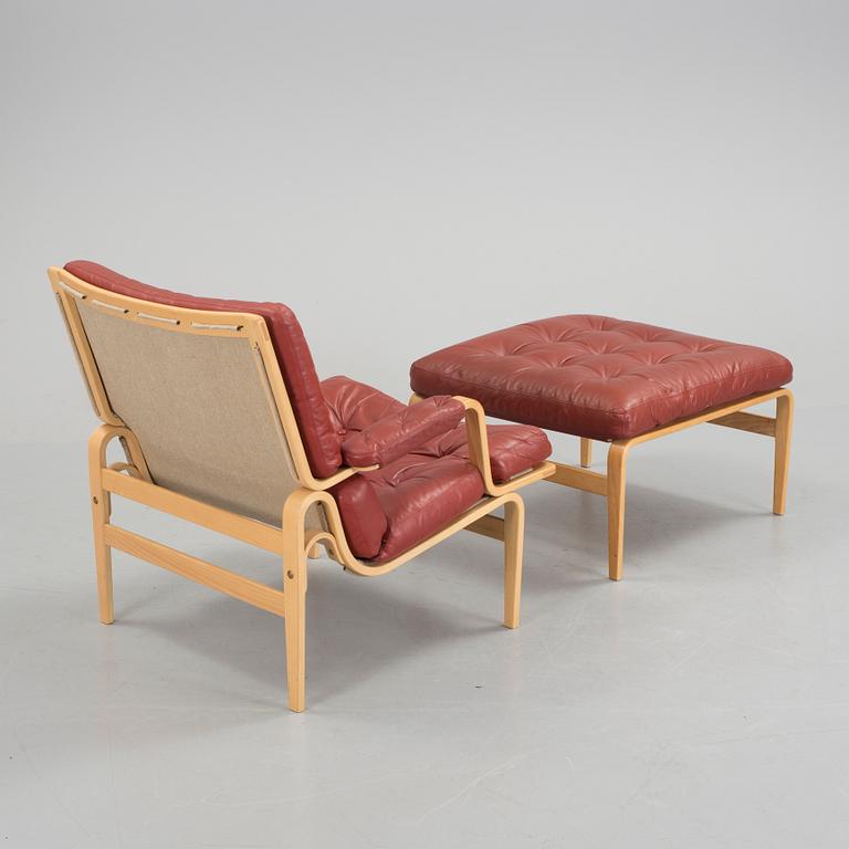 BRUNO MATHSSON, "Ingrid", fåtölj och fotpall, DUX design, 1969.
