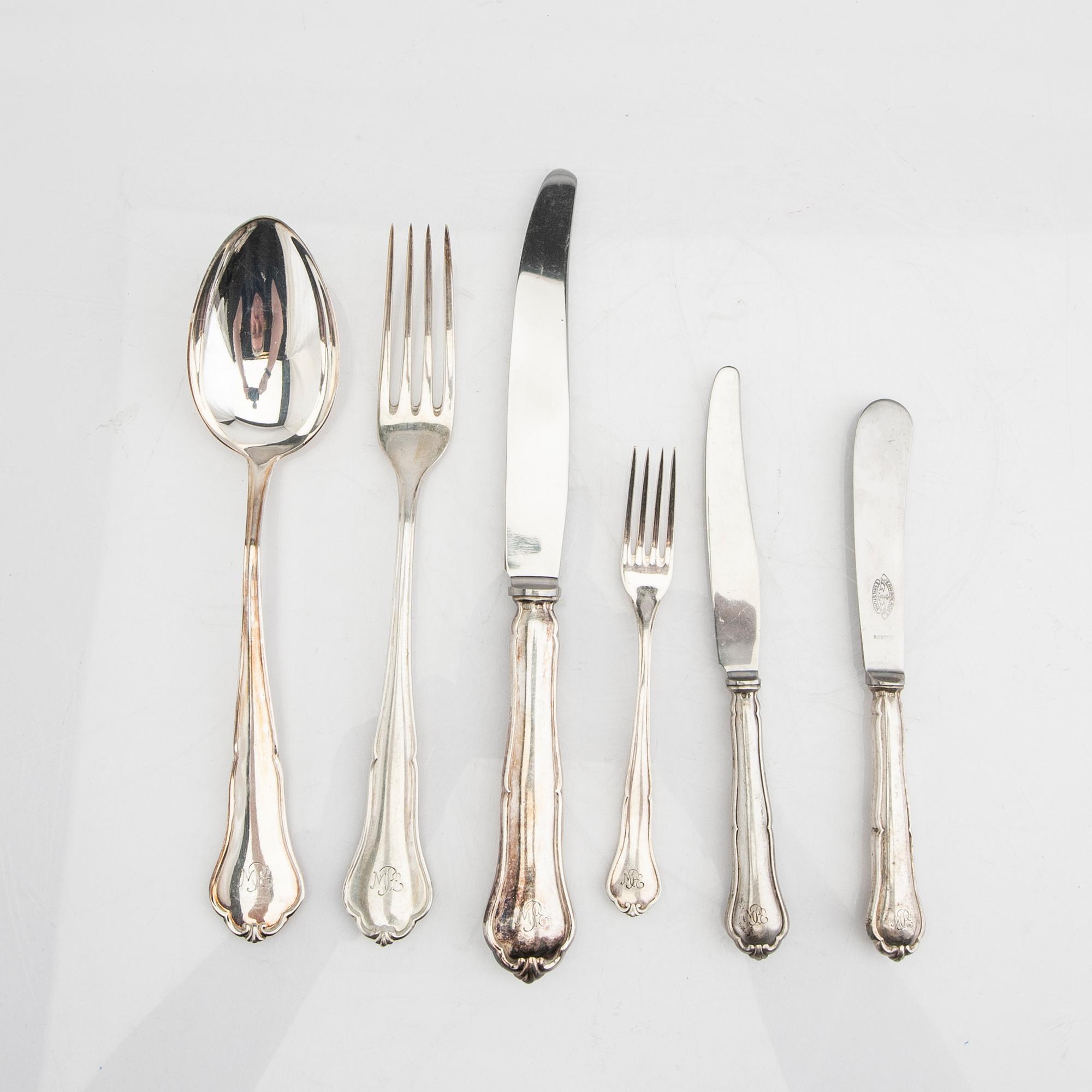 A Swedish 20th century set of 48 pcs of silver cutlery mark of CG Hallberg Malmö 1946, total weight 2426 grams.