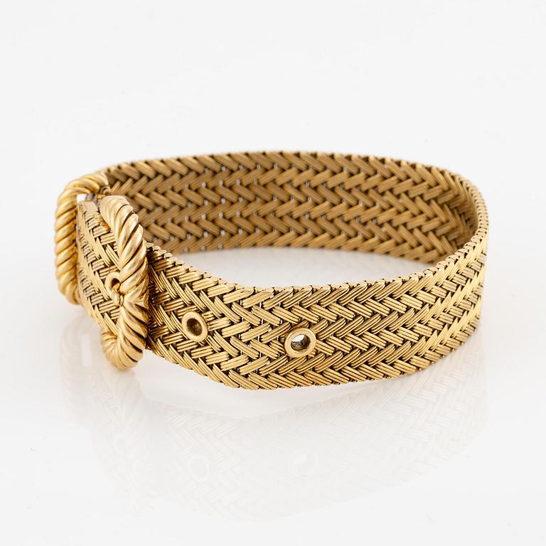 An 18K gold braclet by Georges L'Enfant for Hermès.