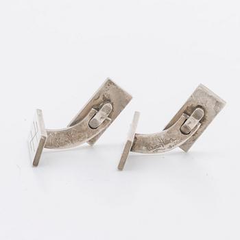 A Swedish 20th century pair of strling cuff links mark of Wiwen Nilsson Lund 1951, weight ca 12,4 gr, length ca 2,2 cm.