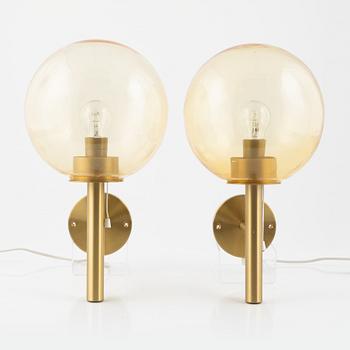 Uno & Östen Kristiansson, a pair of brass and glass wall lights, Luxus, Vittsjö.
