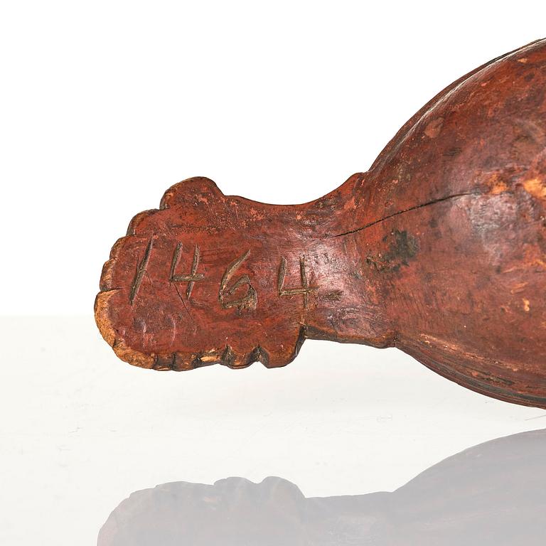 A Swedish carved and painted figural drinking vessel from Jämtland or Härjedalen, late 18th / early 19th century.