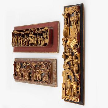 Three wooden panels, China, late Qing dynasty and early 20th century.