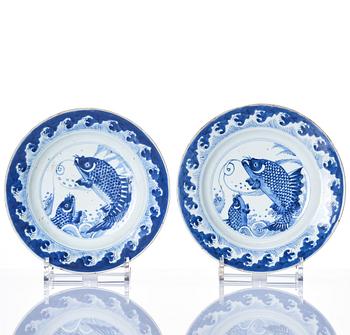 A set of four blue and white dishes with leaping carp, Qing dynasty, Kangxi (1662-1722).