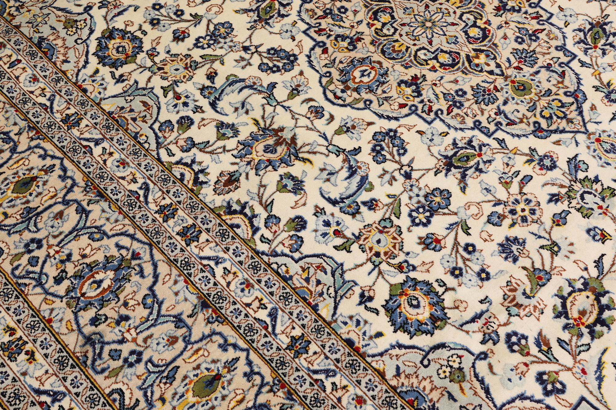 A Keshan carpet, 347 x 245 cm.