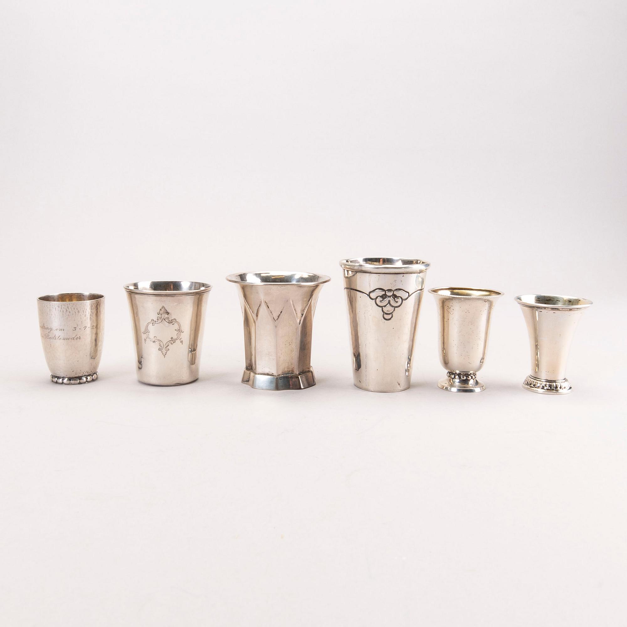 Six 20th century, miniature beakers, silver, makers of Georg Jensen, Lachmann and others.
