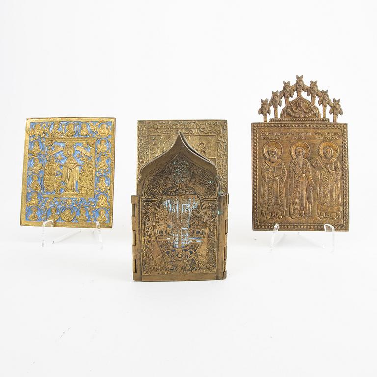 A set of four Russian brass and enamel icons 19th century or older.