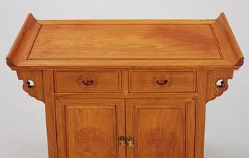 A Chinese hardwood cabinet, second half of the 20th century.