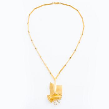 Björn Weckström, a necklace "Inari", 18K gold with faceted rock crystal, Finland. For Lapponia.