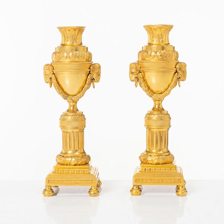 A pair of French Louis XVI style gilt-bronze casolettes, later part 18th century.
