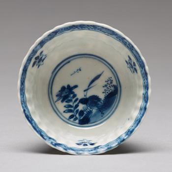 Seven matched blue and white cups with four dishes, Qing dynasty, Kangxi (1662-1722).