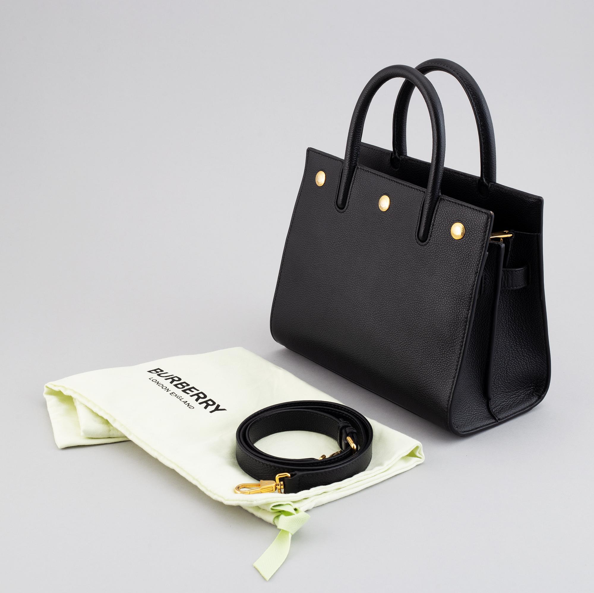 Burberry, a black leather 'Baby Title' handbag, 2019.