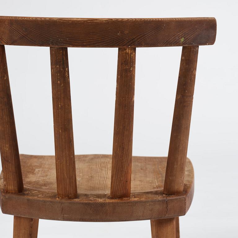 Axel Einar Hjorth, a set of four stained pine "Utö" chairs, Nordiska Kompaniet, Sweden 1930s.