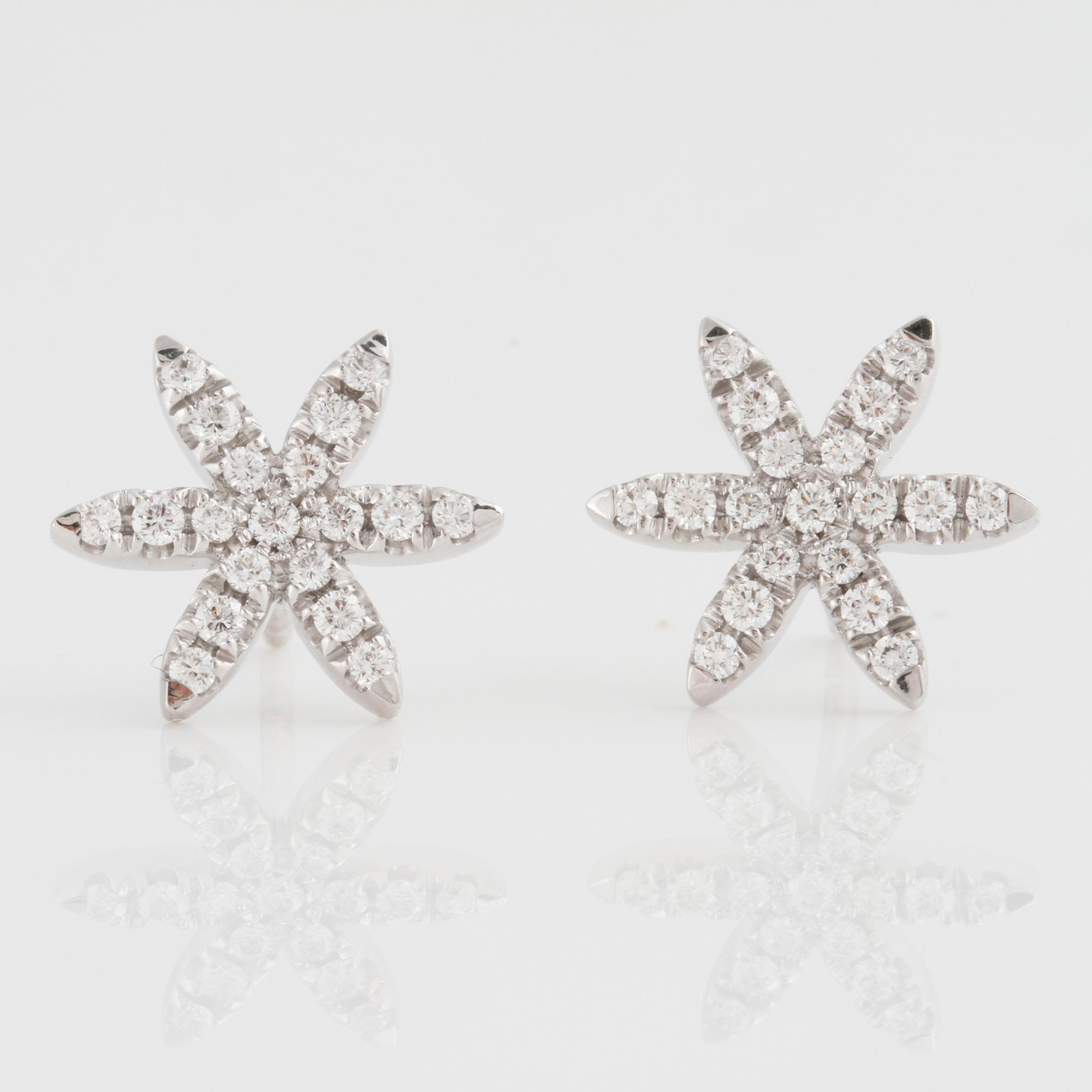 A pair of brilliant-cut diamond earrings. Total carat weight 0.37 cts.