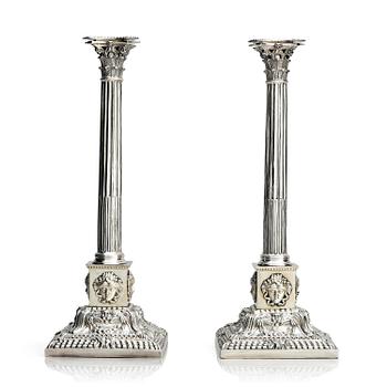 313. A pair of 18th century silver candlesticks, marks of Ebenezer Coker, London , possibly 1765.