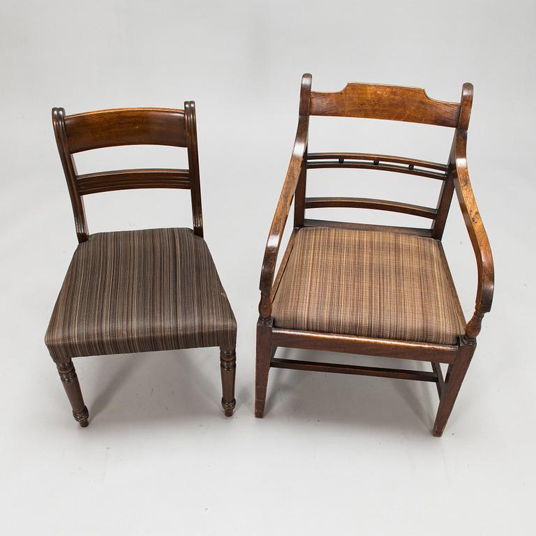 Matbord och 8 stolar, mahogny, tageltyg, England, 1900-talets första hälft.
